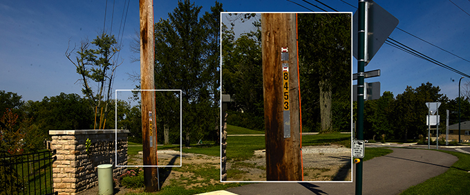 Vehicle-mounted mobile LiDAR technology capturing geospatial data collection along a power line route.